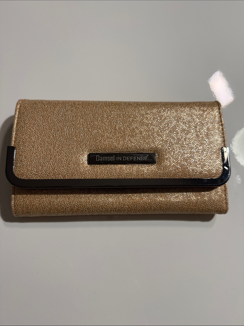 Damsel in Defense Metallic Gold Fold-Over Wallet with Black Trim